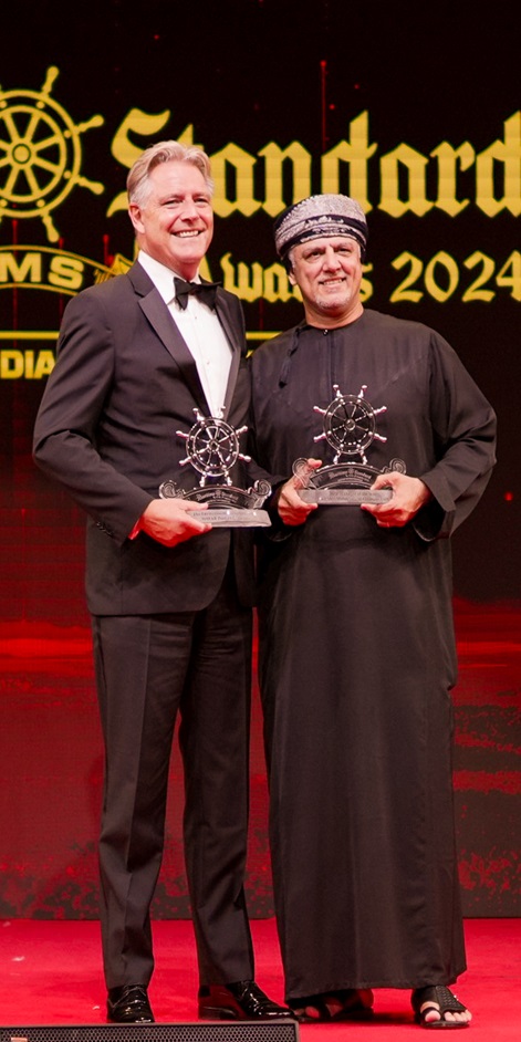 Award-winning maritime professionals display their trophies proudly